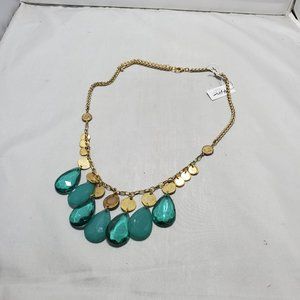 Bijou gold discs and a teal teardrop acrylic stone statement necklace,